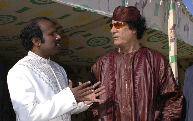 Tri Paul ja Muammar Gaddafi.