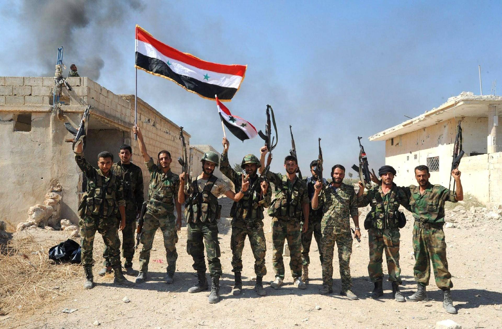 Syyrian hallinnolle uskollisia joukkoja.
